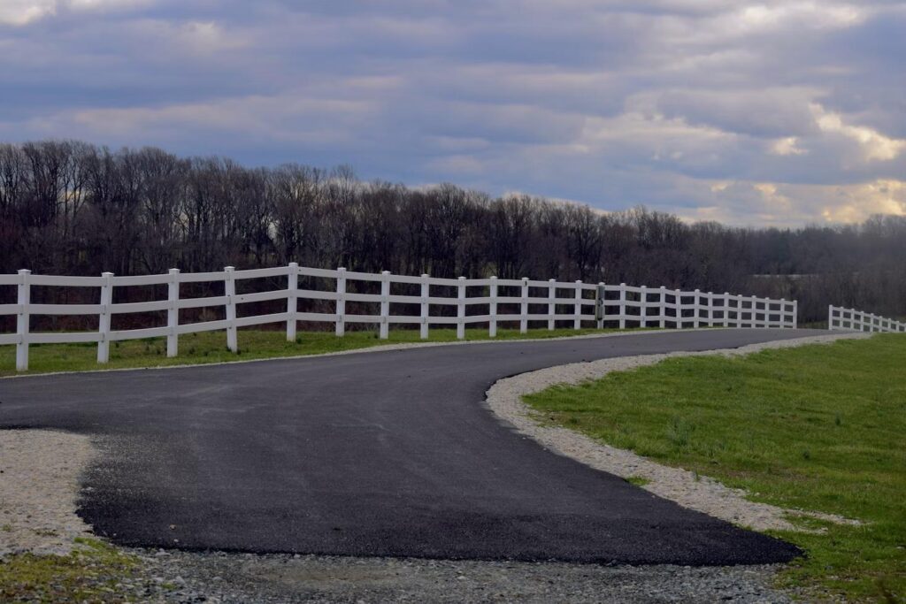 A split rail fence going along a property