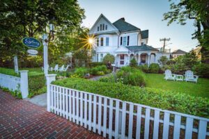 A wooden fence in front of a house