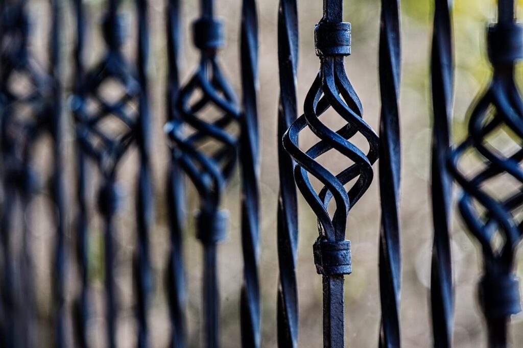 A close-up of a metal fence