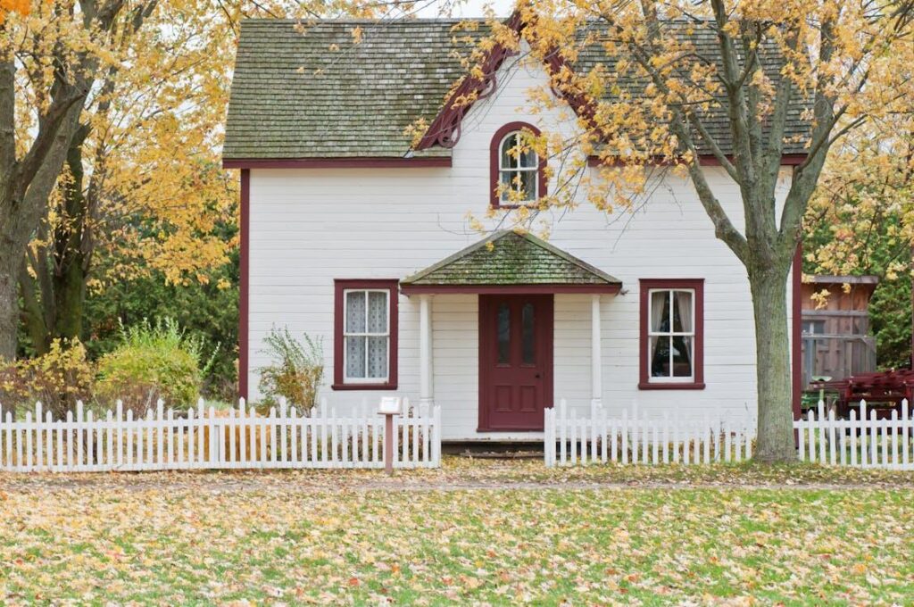 A well-built fence surrounding a house, showcasing security and aesthetic appeal.