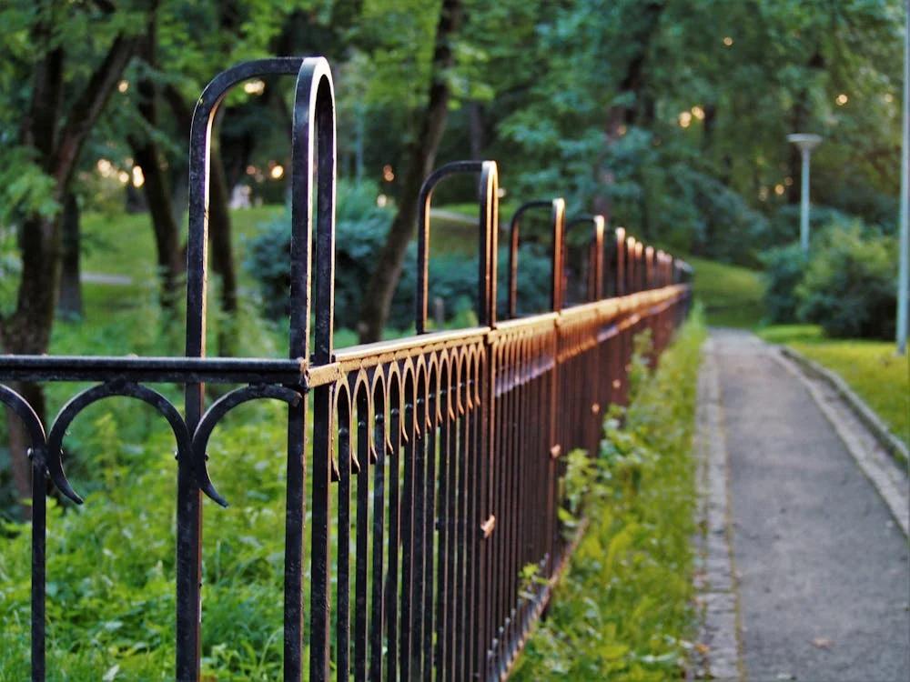 Durable metal fence installed by professionals for lasting security and style.