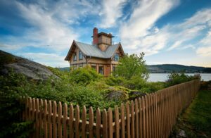 A wooden fence bordering a house