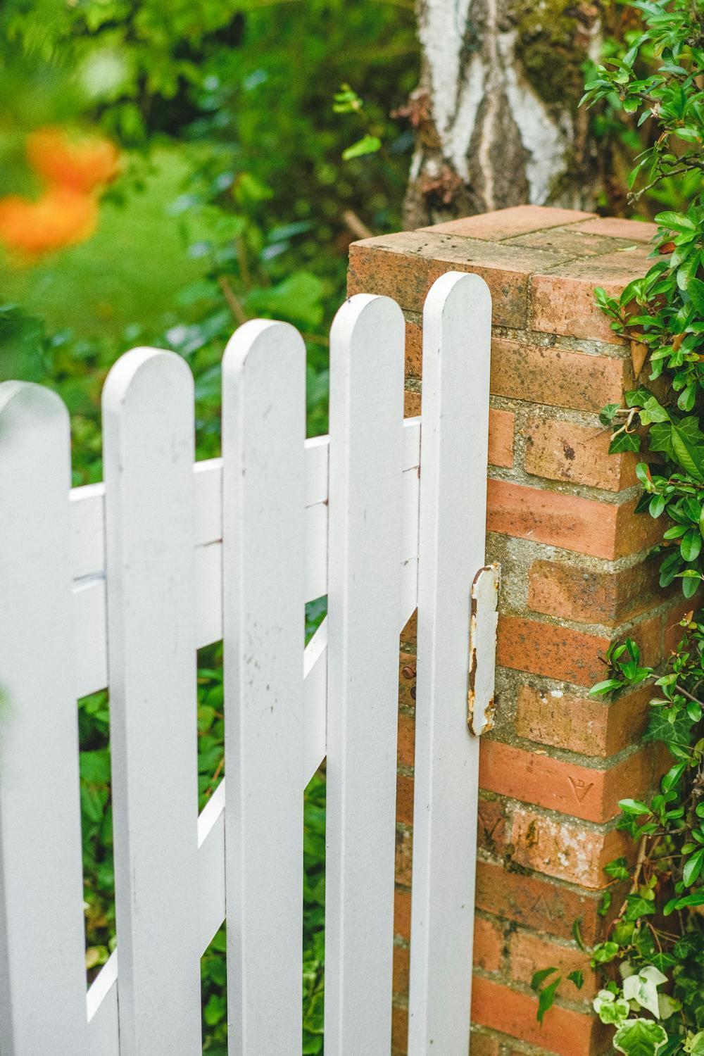 A white fence door